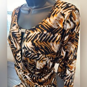 NY Collection Dress with gold hardware accent. Faux half wrap at the waist